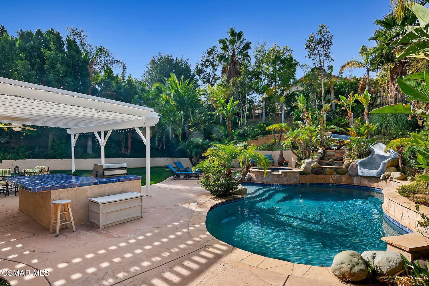 569 Rustic Hills Drive Simi Valley, CA 93065 - Photo 41 of 59 a view of a backyard with sitting area and furniture