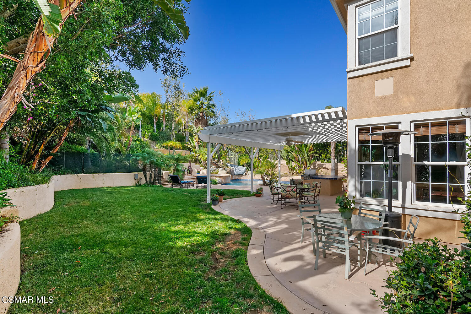 569 Rustic Hills Drive Simi Valley, CA 93065 - Photo 46 of 59 a view of a house with backyard porch and sitting area