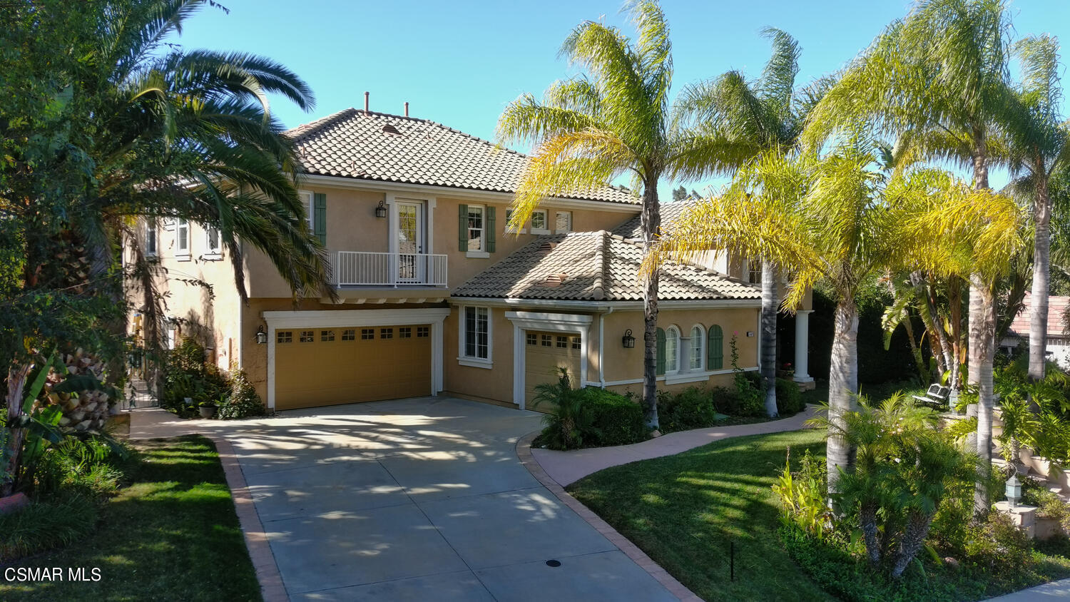 569 Rustic Hills Drive Simi Valley, CA 93065 - Photo 59 of 59 a front view of a house with a garden