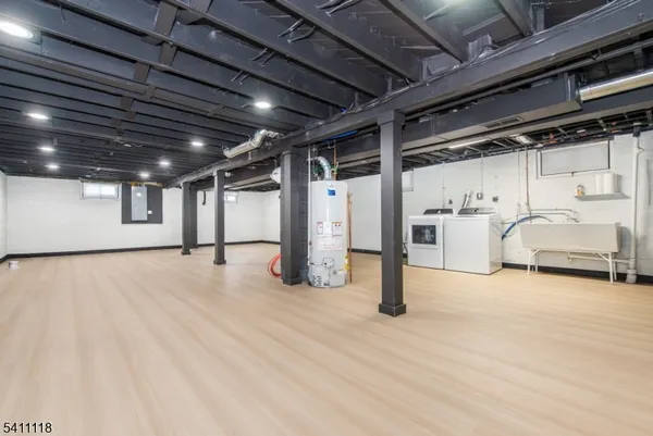 a view of a room with wooden ceiling