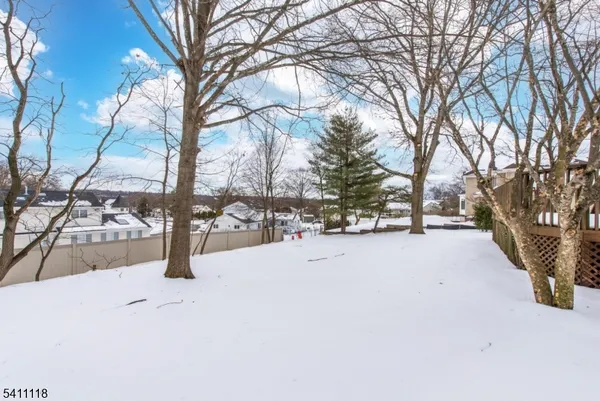 a view of snow on the street