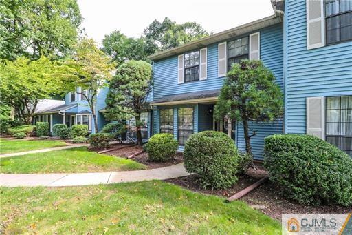 1804 Timber Oaks Road Edison, NJ 08820 - Photo 2 of 23 a view of a house with a yard and plants