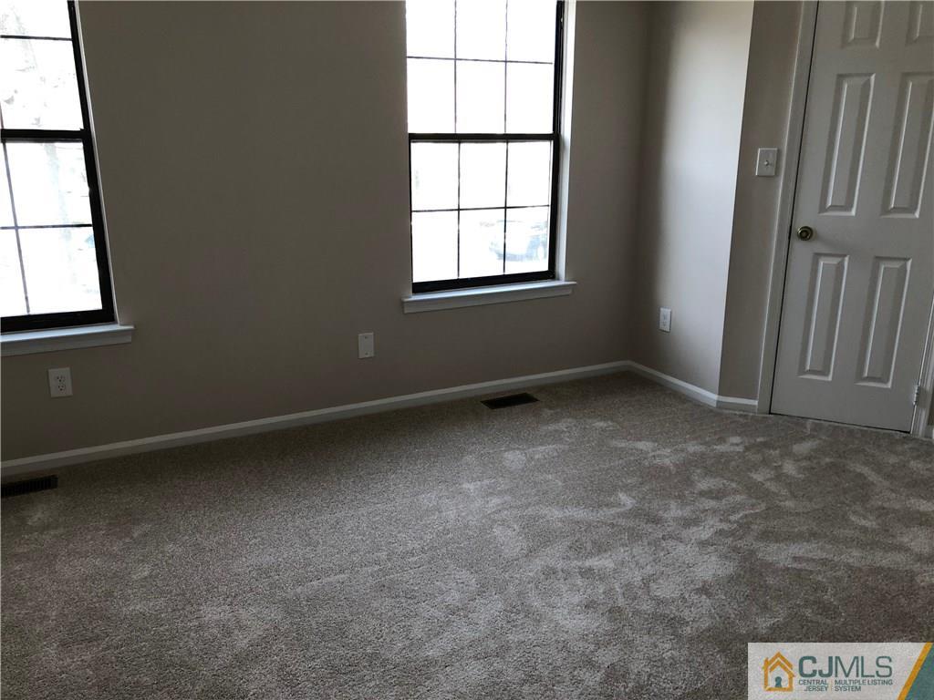 1804 Timber Oaks Road Edison, NJ 08820 - Photo 21 of 23 an empty room with a window