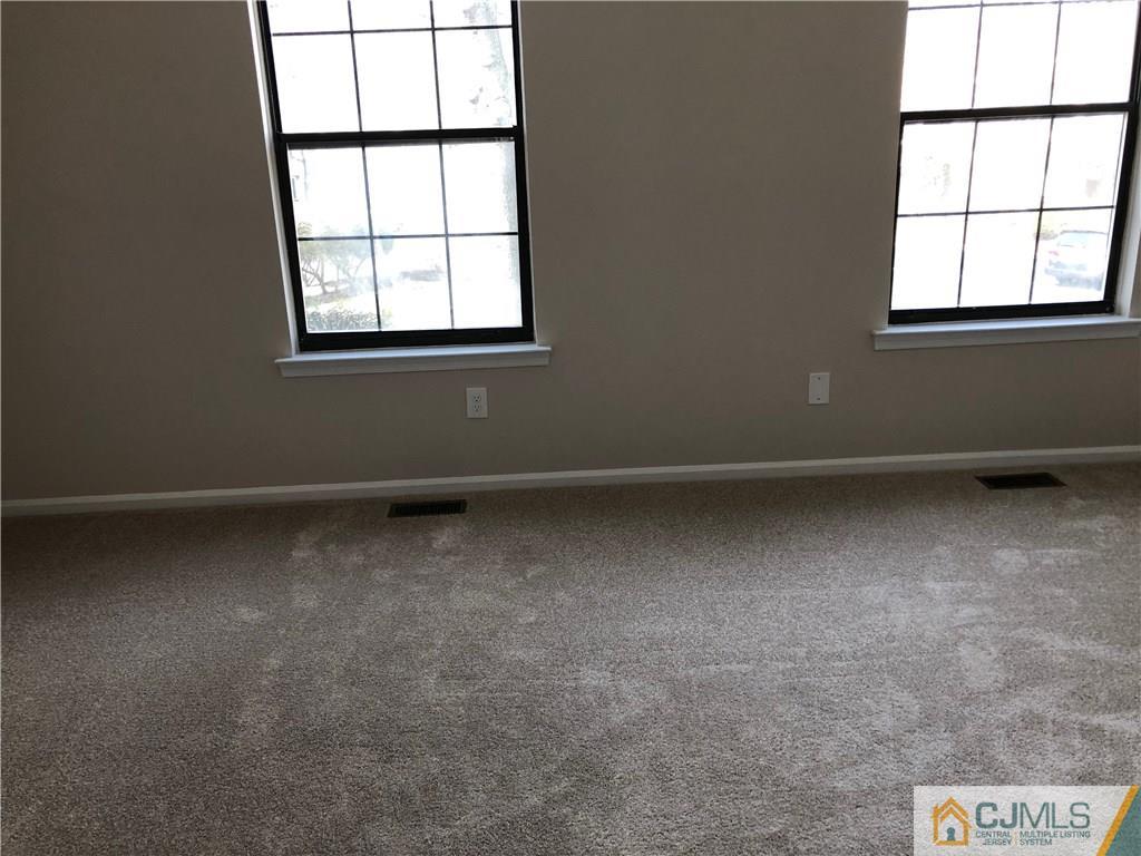 1804 Timber Oaks Road Edison, NJ 08820 - Photo 22 of 23 an empty room with a window