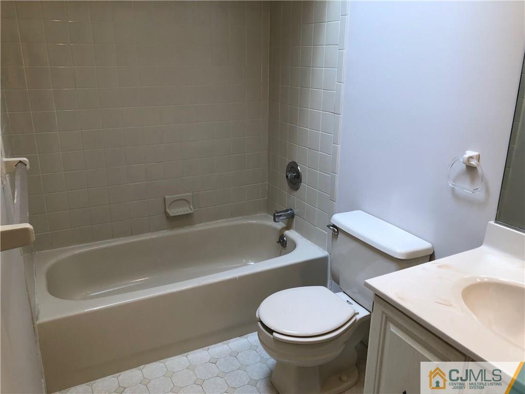 1804 Timber Oaks Road Edison, NJ 08820 - Photo 23 of 23 a bathroom with a sink and toilet