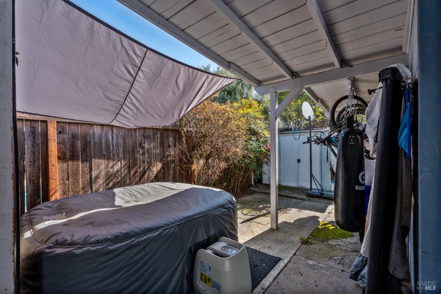 187 Magnolia Street Ukiah, CA 95482 - Photo 18 of 22 a bedroom with a bed and a balcony view