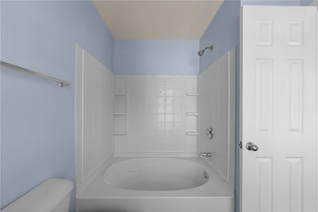 a bathroom with a bathtub