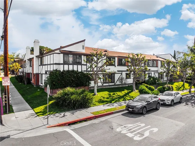 a view of a street with cars