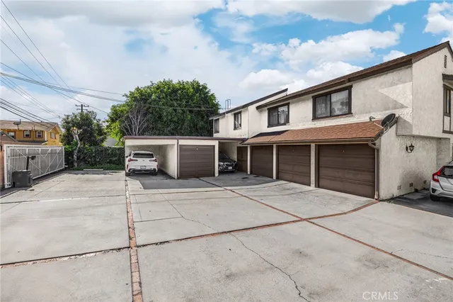 a front view of a house with a garage