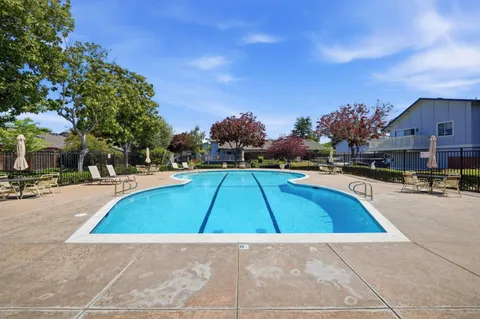 a view of outdoor space yard swimming pool and patio