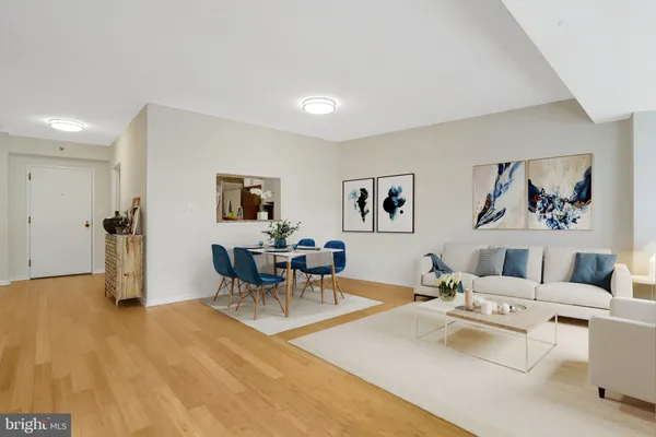 a living room with furniture and a table