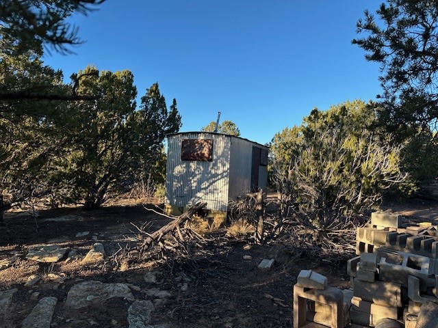 103 Hidden Valley Ranch Road Ilfeld, NM 87538 - Photo 47 of 49 Storage shed, in poor condition