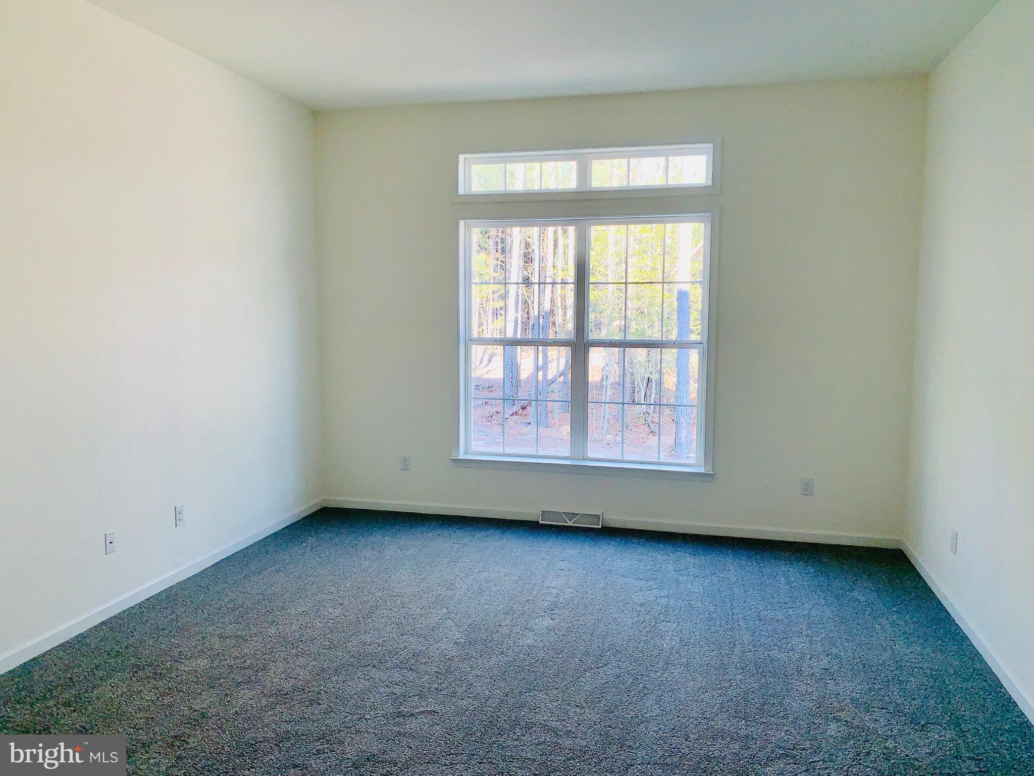 6 Patriots Way Georgetown, DE 19947 - Photo 23 of 35 an empty room with a window