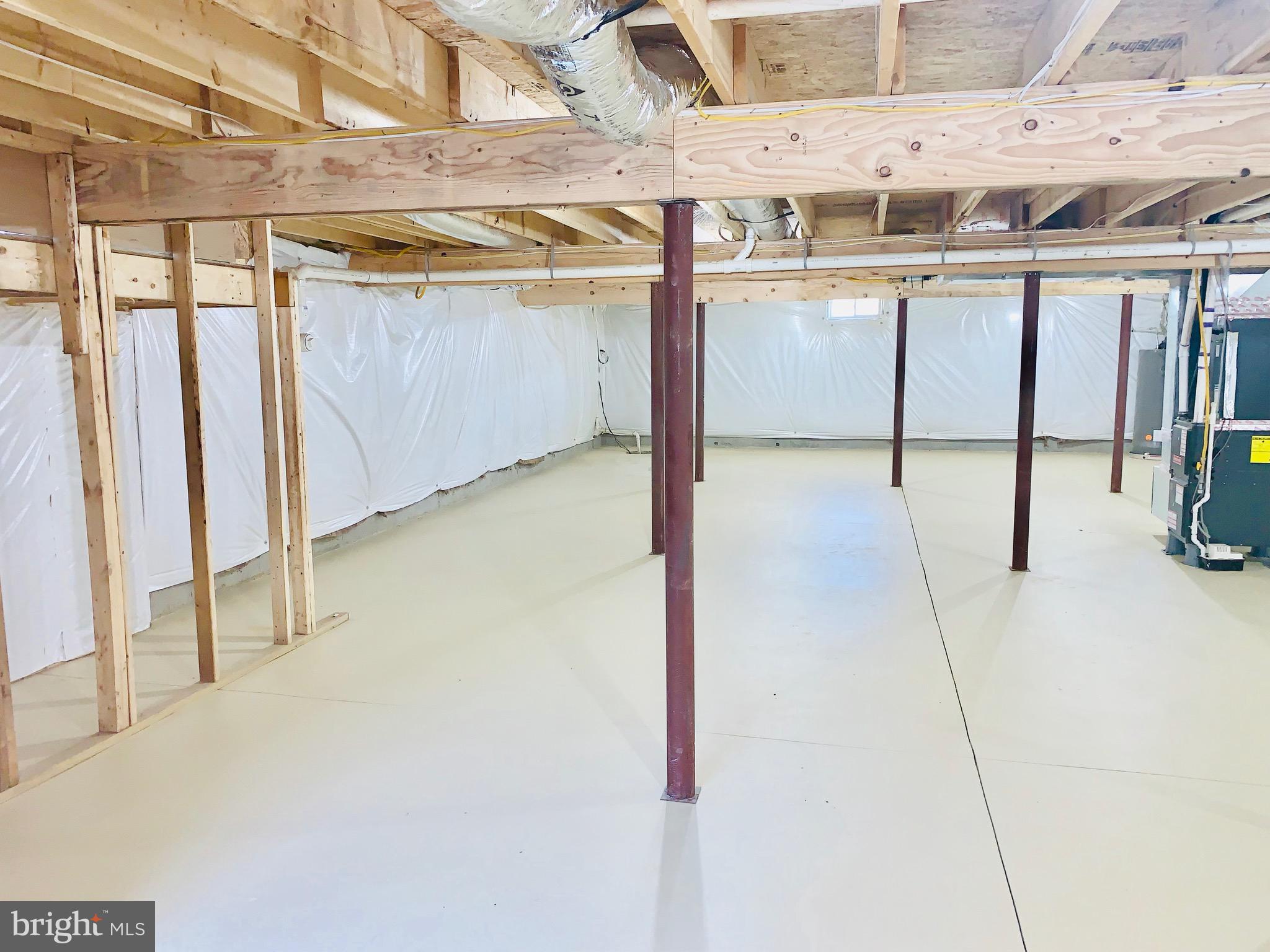 6 Patriots Way Georgetown, DE 19947 - Photo 30 of 35 a view of a room with racks on the wall