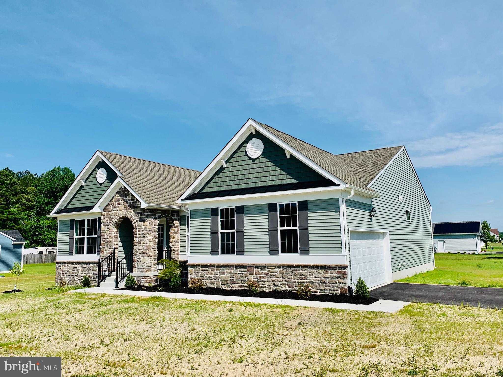 6 Patriots Way Georgetown, DE 19947 - Photo 33 of 35 a front view of a house with a yard