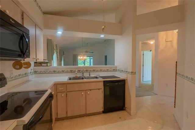 a spacious bathroom with a granite countertop sink a large mirror and a bathtub