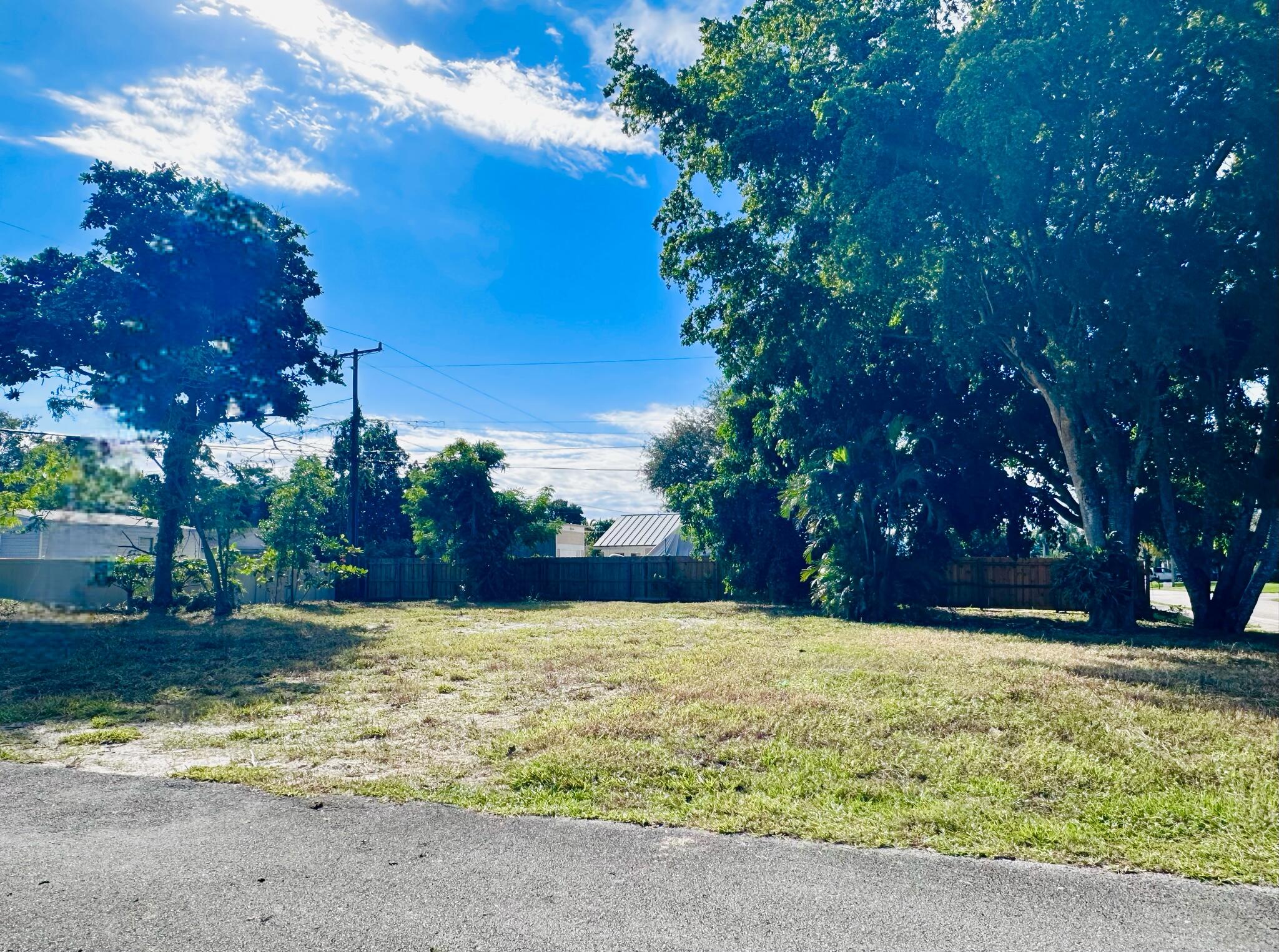 4802 Bonanza Road Lake Worth, FL 33467 - Photo 5 of 10 a view of yard with tree in the background