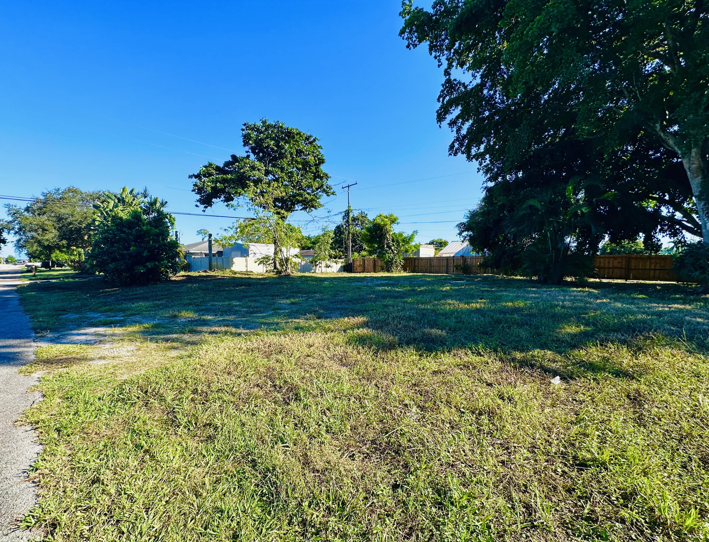 4802 Bonanza Road Lake Worth, FL 33467 - Photo 7 of 10 a view of a golf course with a lake view