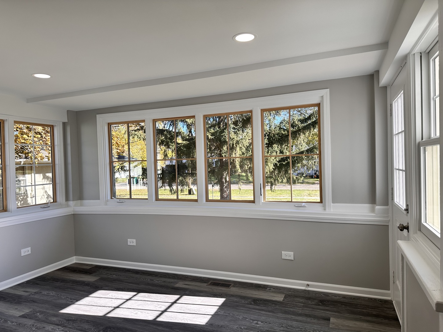 210 West Hall Street Leland, IL 60531 - Photo 15 of 36 an empty room with wooden floor and windows