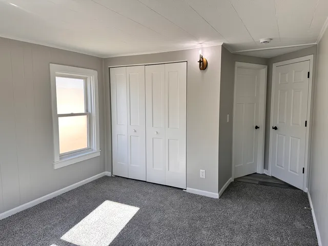 a view of empty room with windows