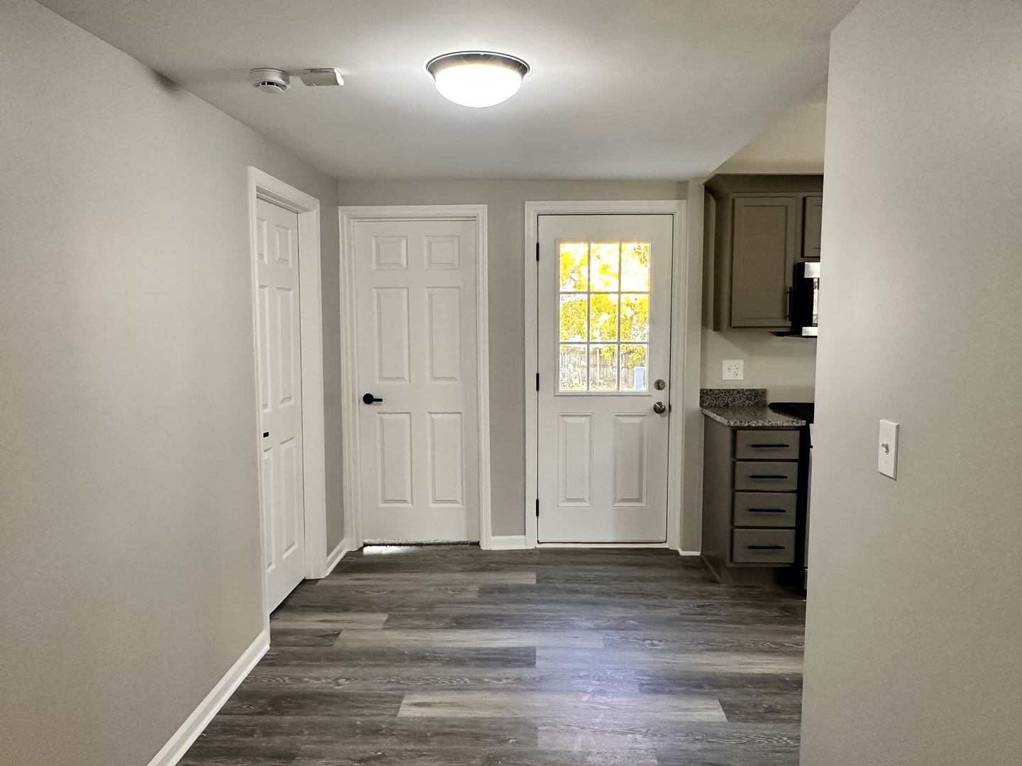 210 West Hall Street Leland, IL 60531 - Photo 28 of 36 wooden floor in an empty room with a window