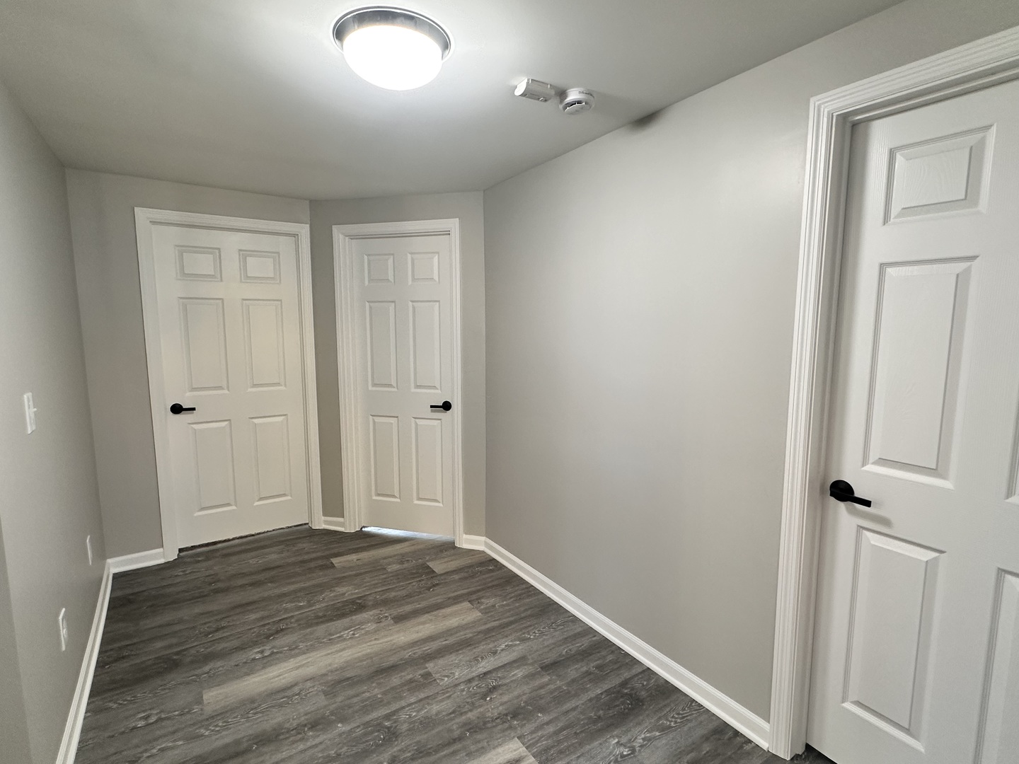 210 West Hall Street Leland, IL 60531 - Photo 29 of 36 an empty room with wooden floor and closet