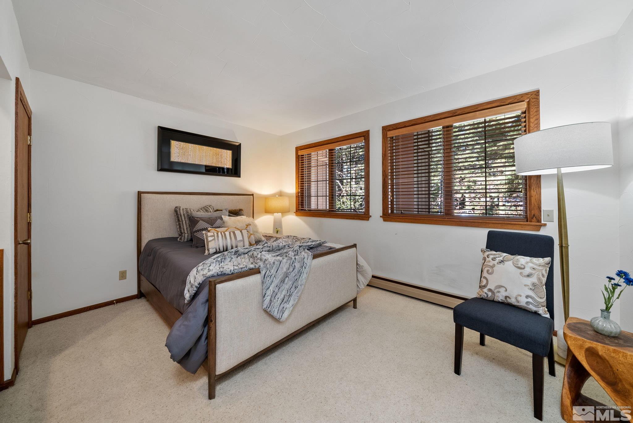 106 Jobs Peak Road Incline Village, NV 89451 - Photo 13 of 40 a bedroom with bed and a window