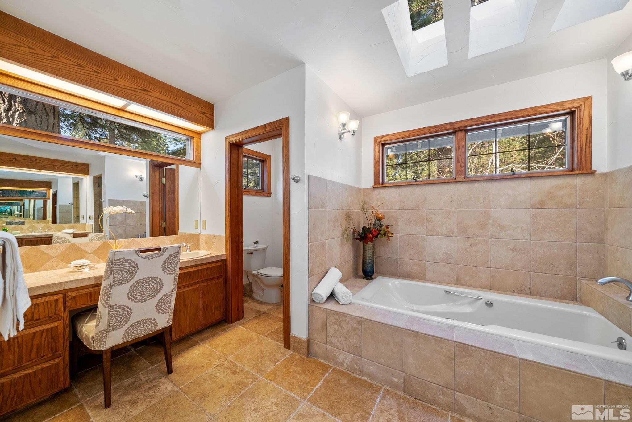 106 Jobs Peak Road Incline Village, NV 89451 - Photo 20 of 40 a bath room with a bath tub and a shower