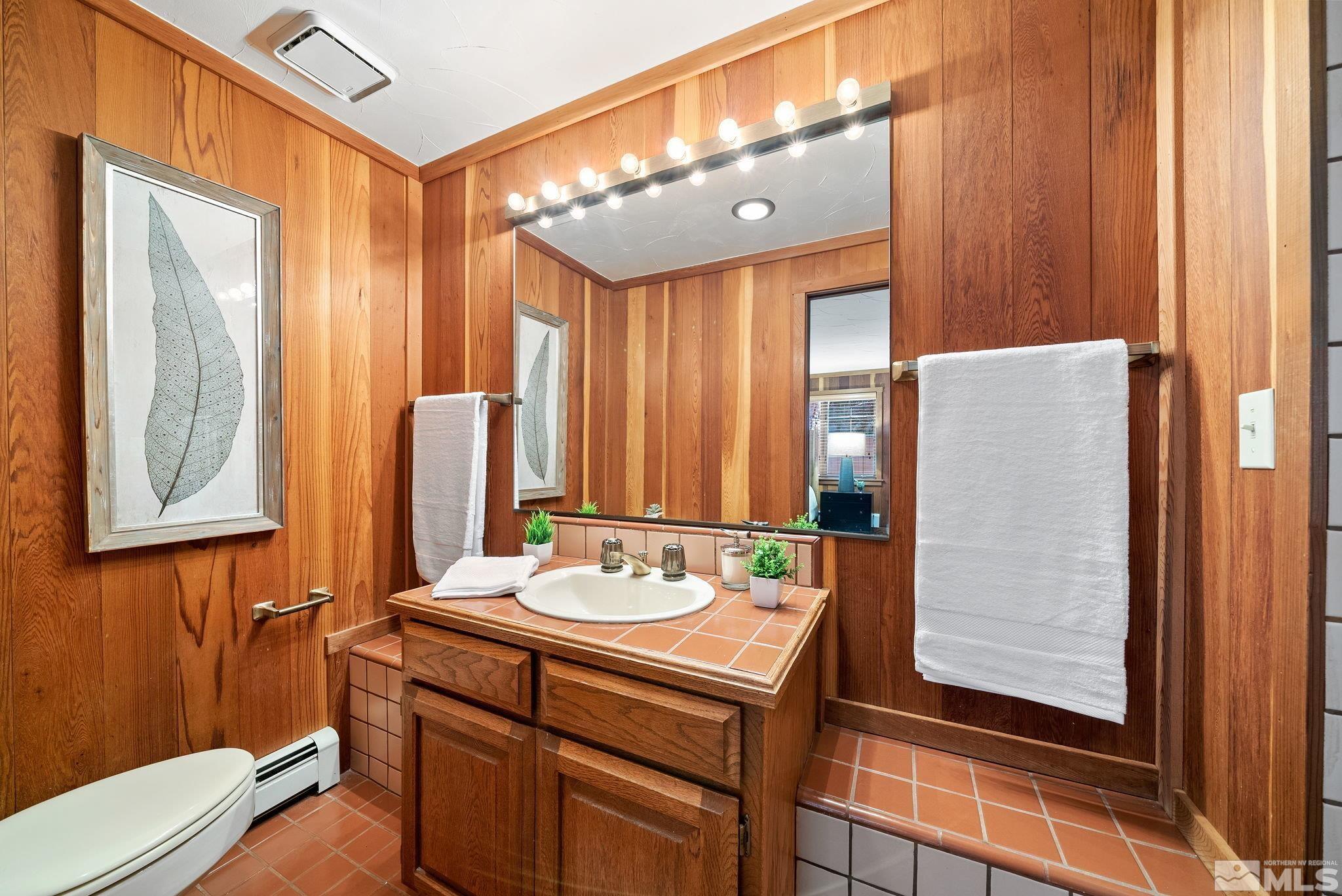 106 Jobs Peak Road Incline Village, NV 89451 - Photo 24 of 40 a bathroom with a sink a mirror and a shower