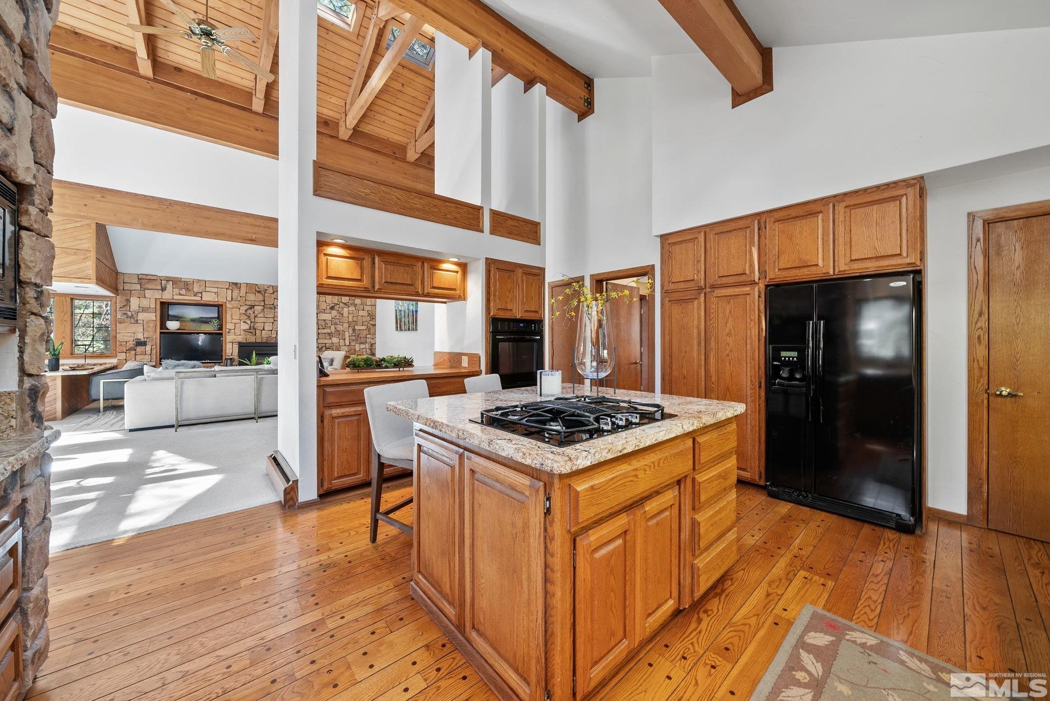 106 Jobs Peak Road Incline Village, NV 89451 - Photo 7 of 40 a kitchen with stainless steel appliances granite countertop a stove and a refrigerator
