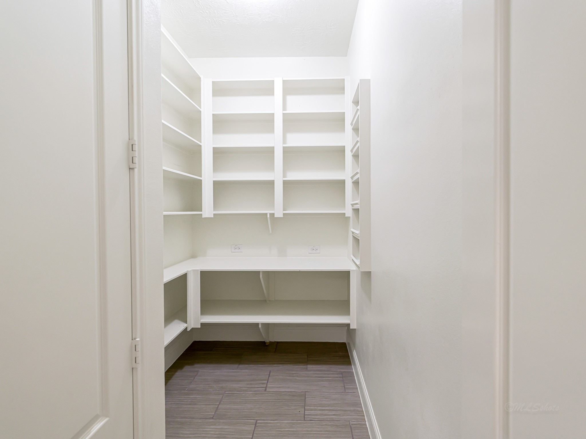 1710 Rice Mill Drive Katy, TX 77493 - Photo 18 of 50 a storage room with empty racks