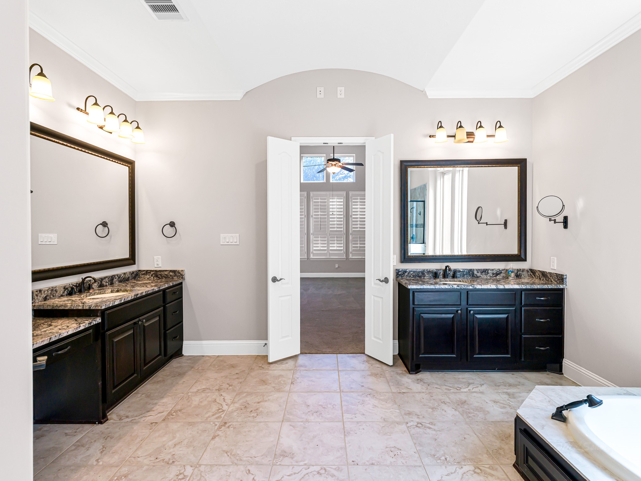 1710 Rice Mill Drive Katy, TX 77493 - Photo 23 of 50 a kitchen with stainless steel appliances granite countertop a stove and a sink
