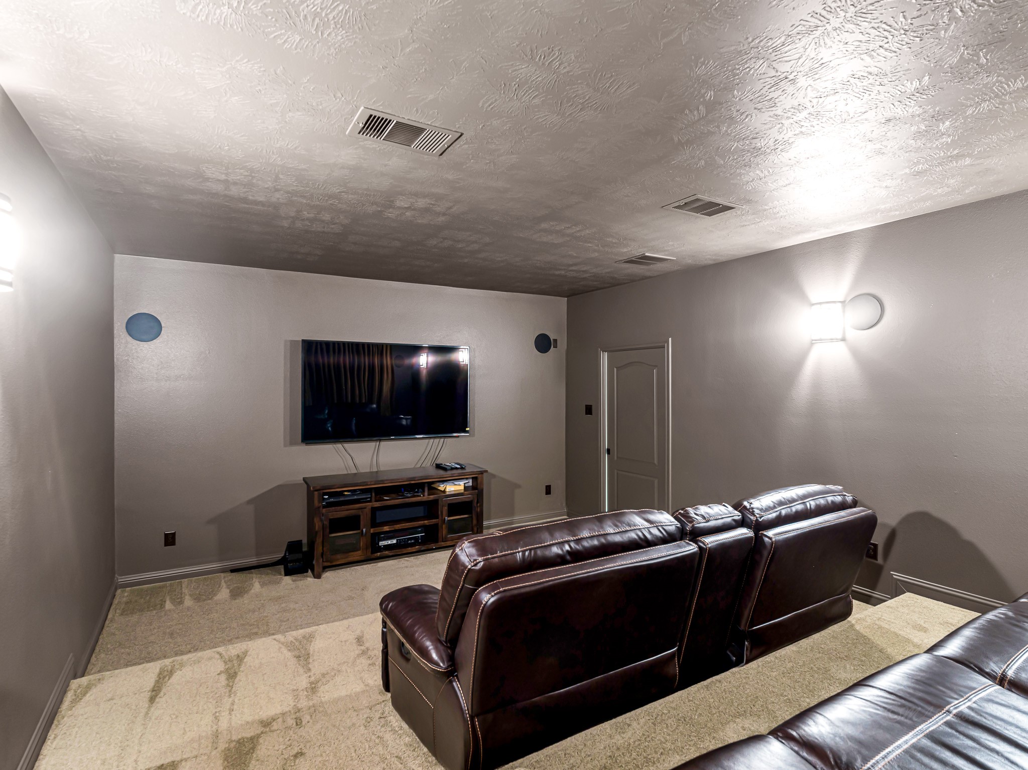 1710 Rice Mill Drive Katy, TX 77493 - Photo 32 of 50 a living room with furniture and a flat screen tv