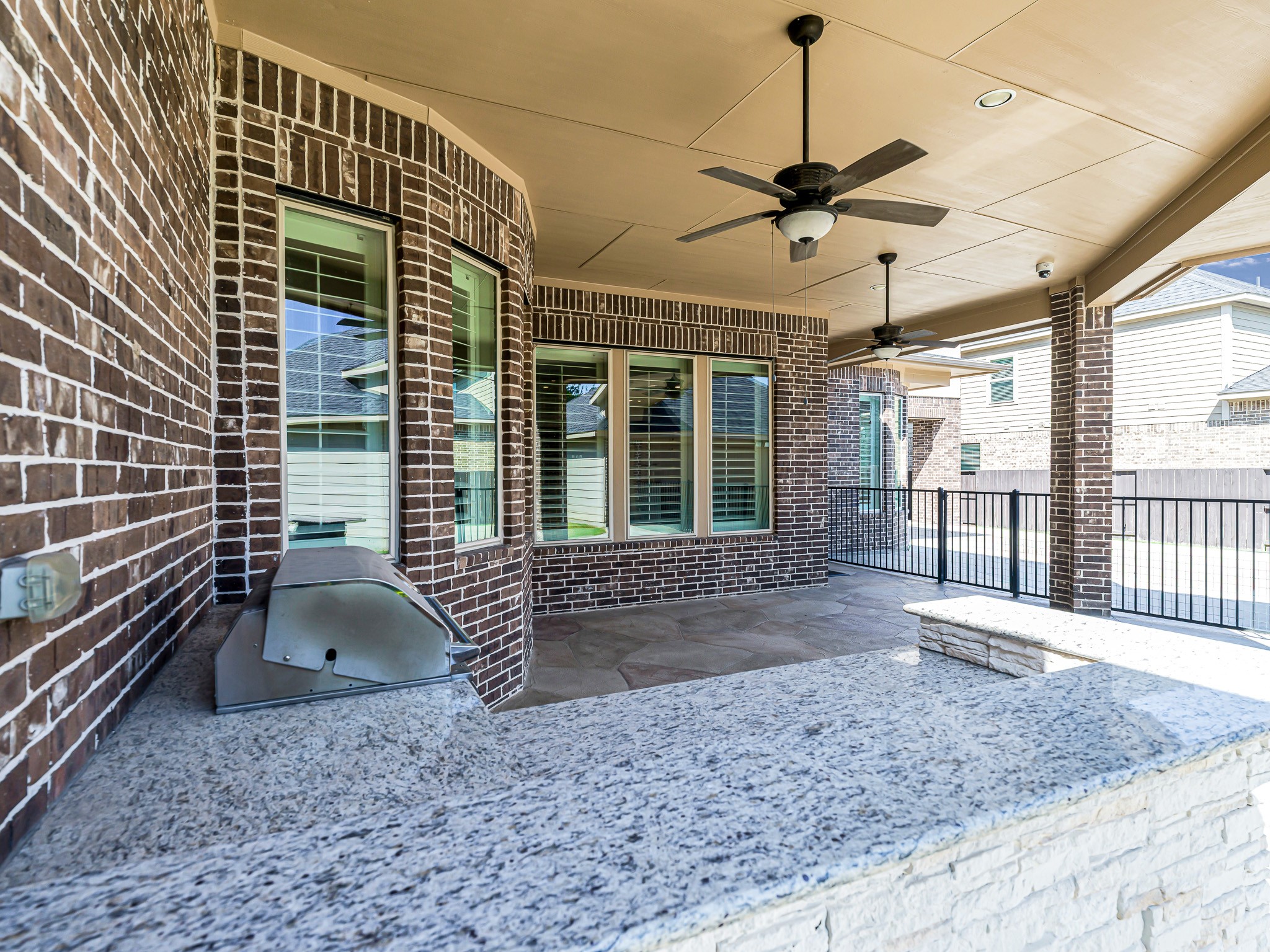 1710 Rice Mill Drive Katy, TX 77493 - Photo 39 of 50 a porch with a couch and chairs