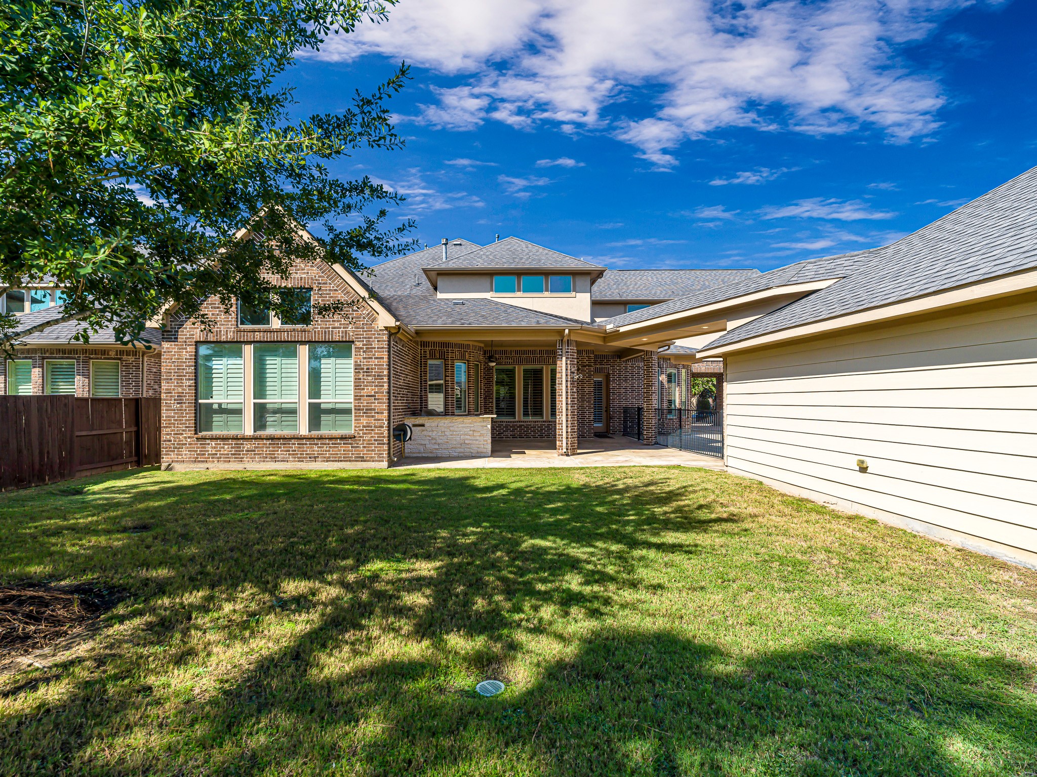 1710 Rice Mill Drive Katy, TX 77493 - Photo 40 of 50 a front view of a house with a garden