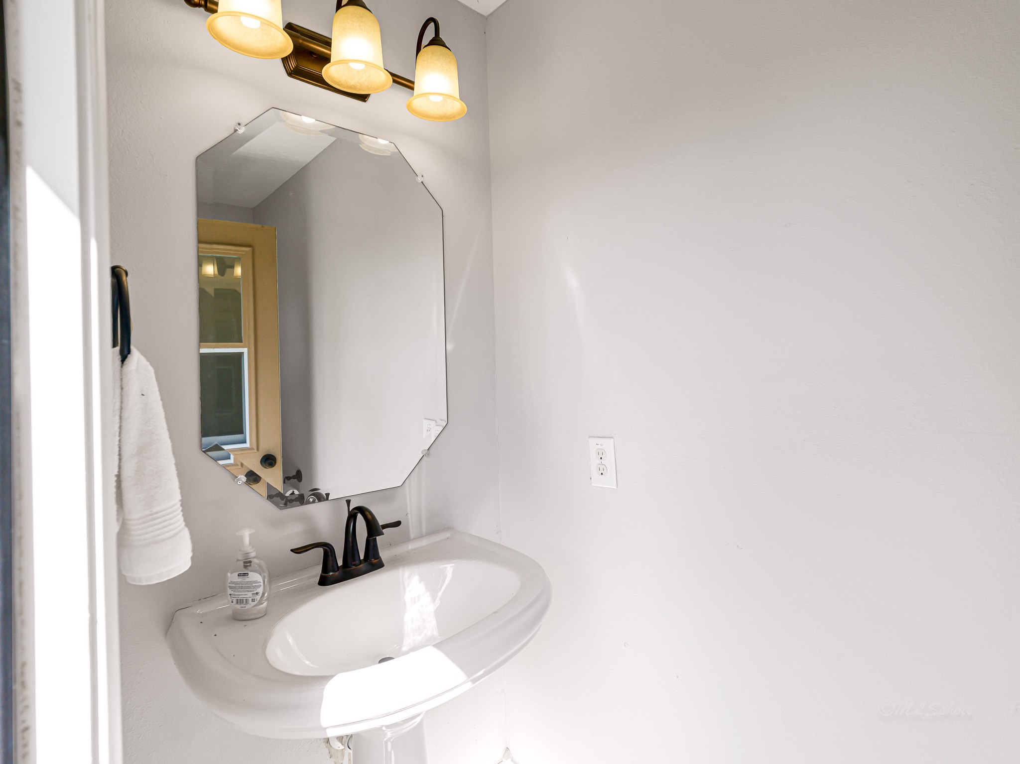 1710 Rice Mill Drive Katy, TX 77493 - Photo 42 of 50 a bathroom with a sink and a mirror