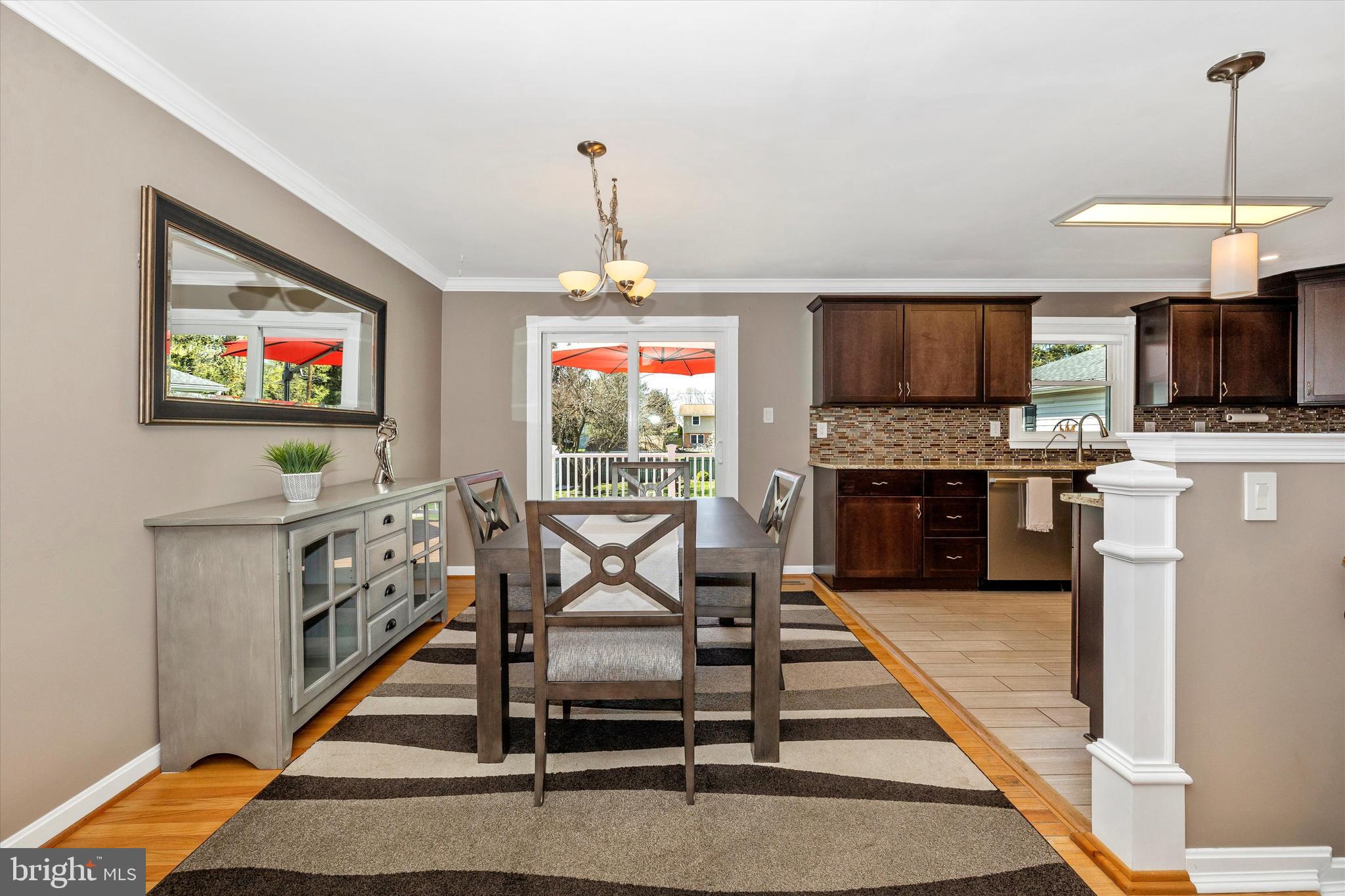 8107 Broadview Drive Frederick, MD 21701 - Photo 12 of 54 a view of a livingroom with furniture a flat screen tv and a fireplace