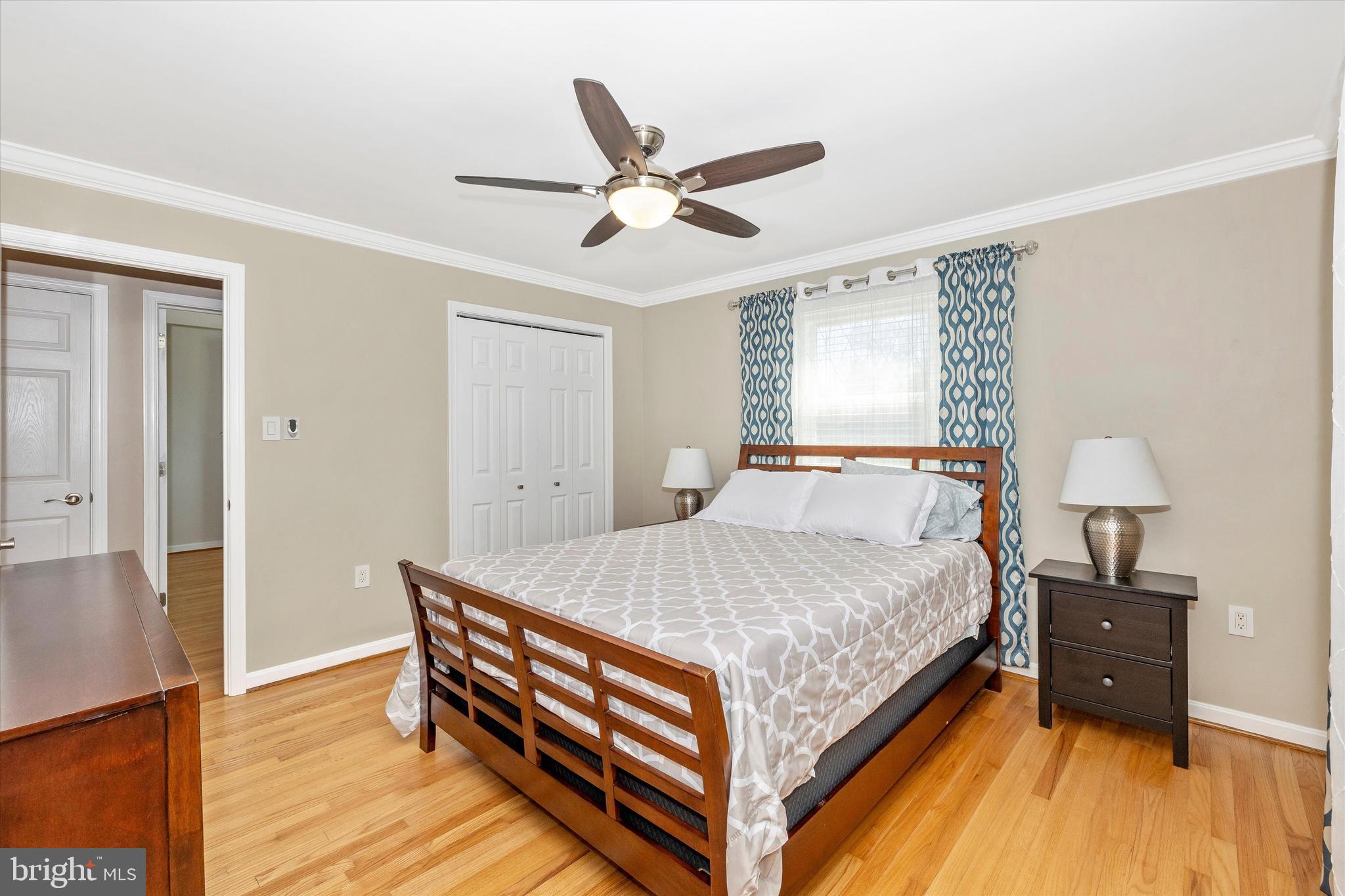 8107 Broadview Drive Frederick, MD 21701 - Photo 20 of 54 a bedroom with a bed and wooden floor