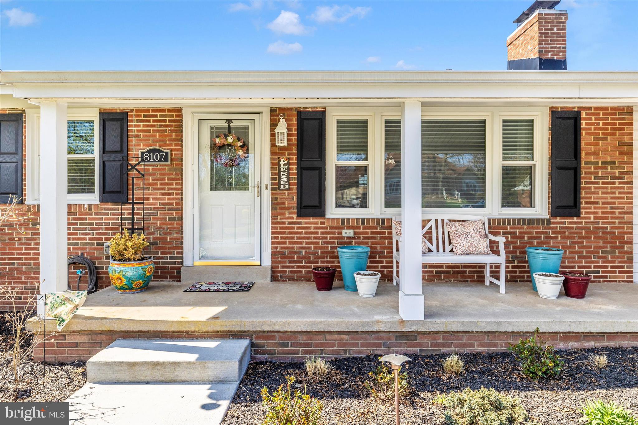 8107 Broadview Drive Frederick, MD 21701 - Photo 2 of 54 front view of a brick house with a window