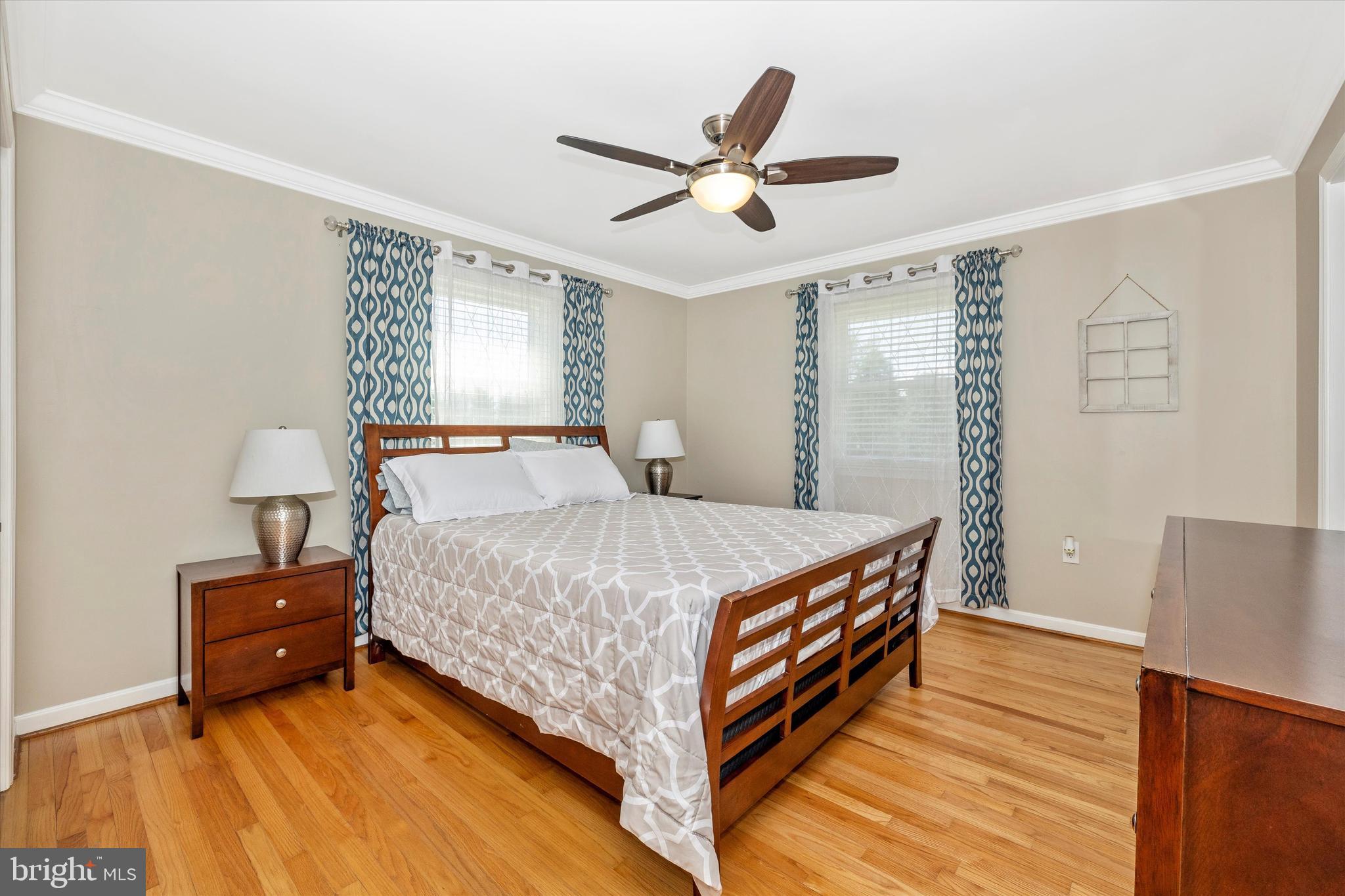 8107 Broadview Drive Frederick, MD 21701 - Photo 23 of 54 a bed room with a bed and a ceiling fan
