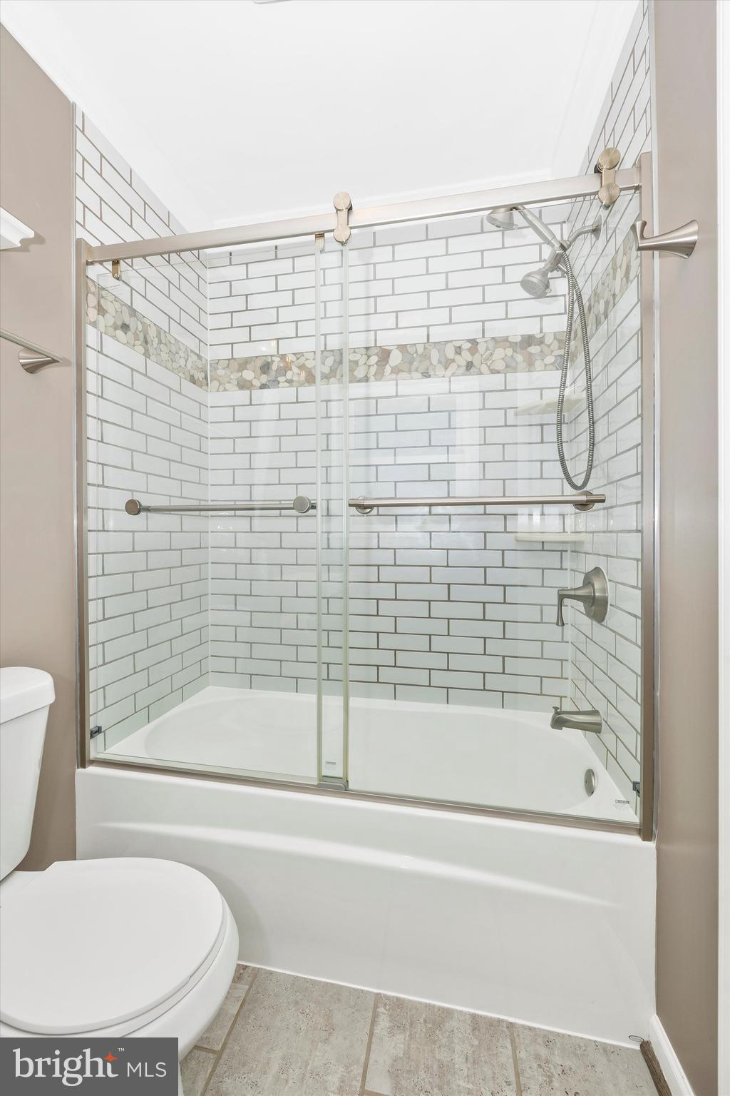 8107 Broadview Drive Frederick, MD 21701 - Photo 25 of 54 a bathroom with a toilet and a bathtub