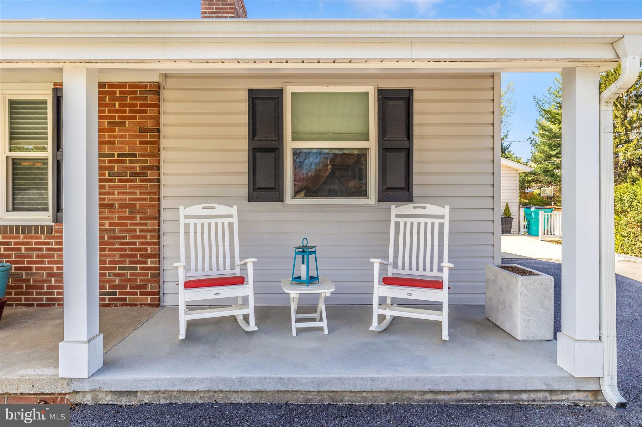 8107 Broadview Drive Frederick, MD 21701 - Photo 3 of 54 a backyard of a house with table and chairs