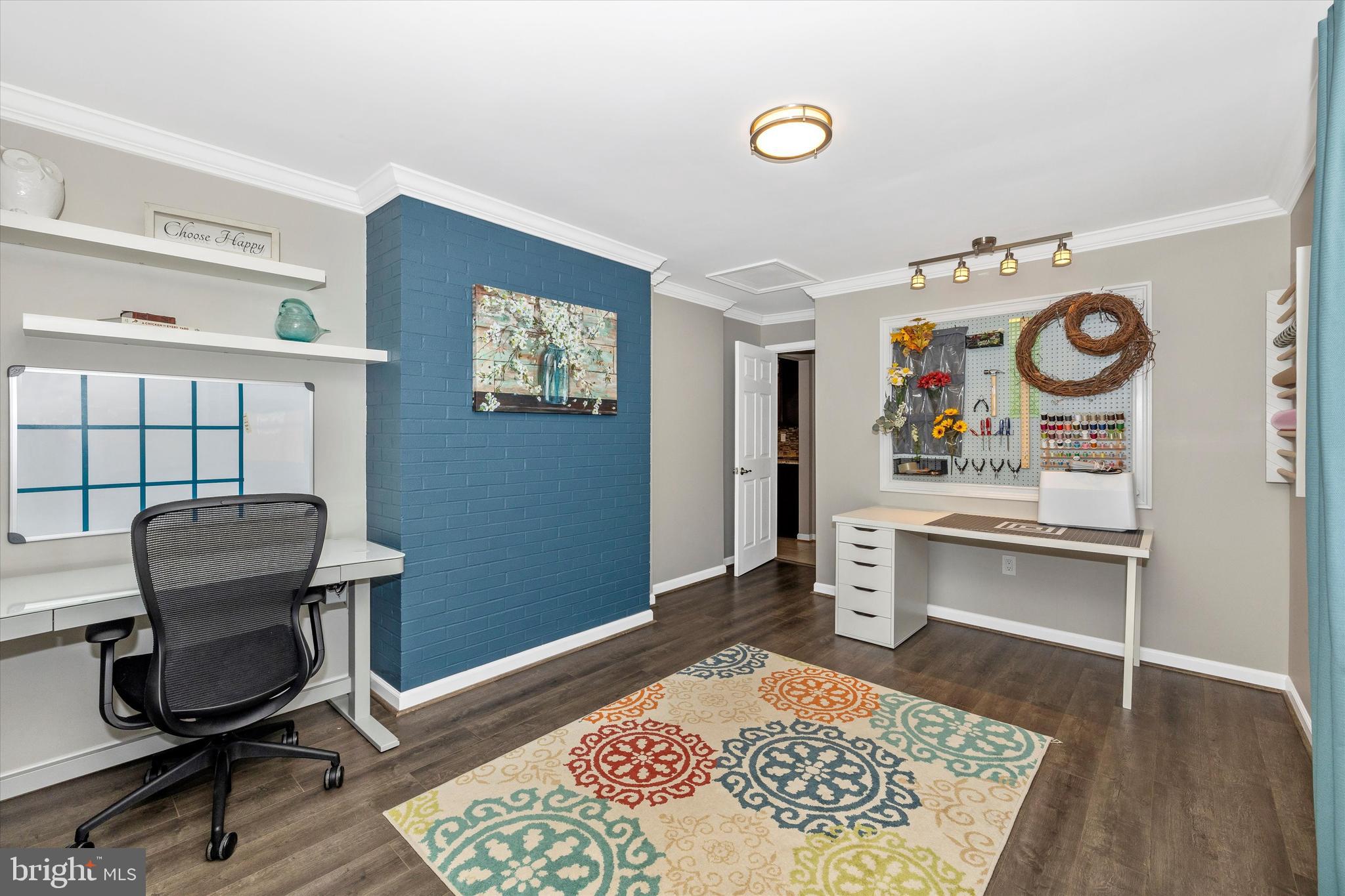 8107 Broadview Drive Frederick, MD 21701 - Photo 31 of 54 a view of a workspace with furniture and a window