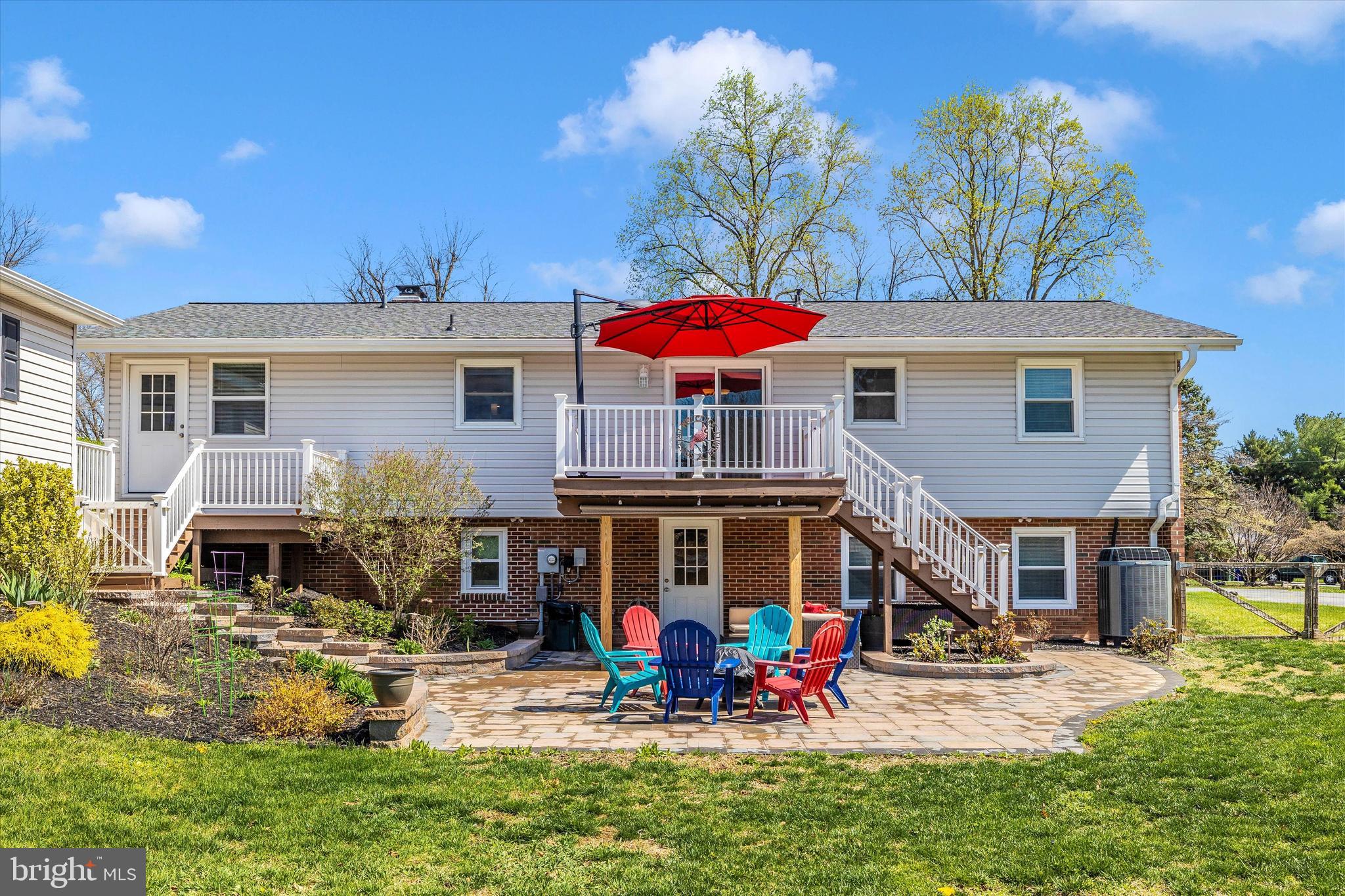 8107 Broadview Drive Frederick, MD 21701 - Photo 42 of 54 a view of a house with a yard patio and fire pit