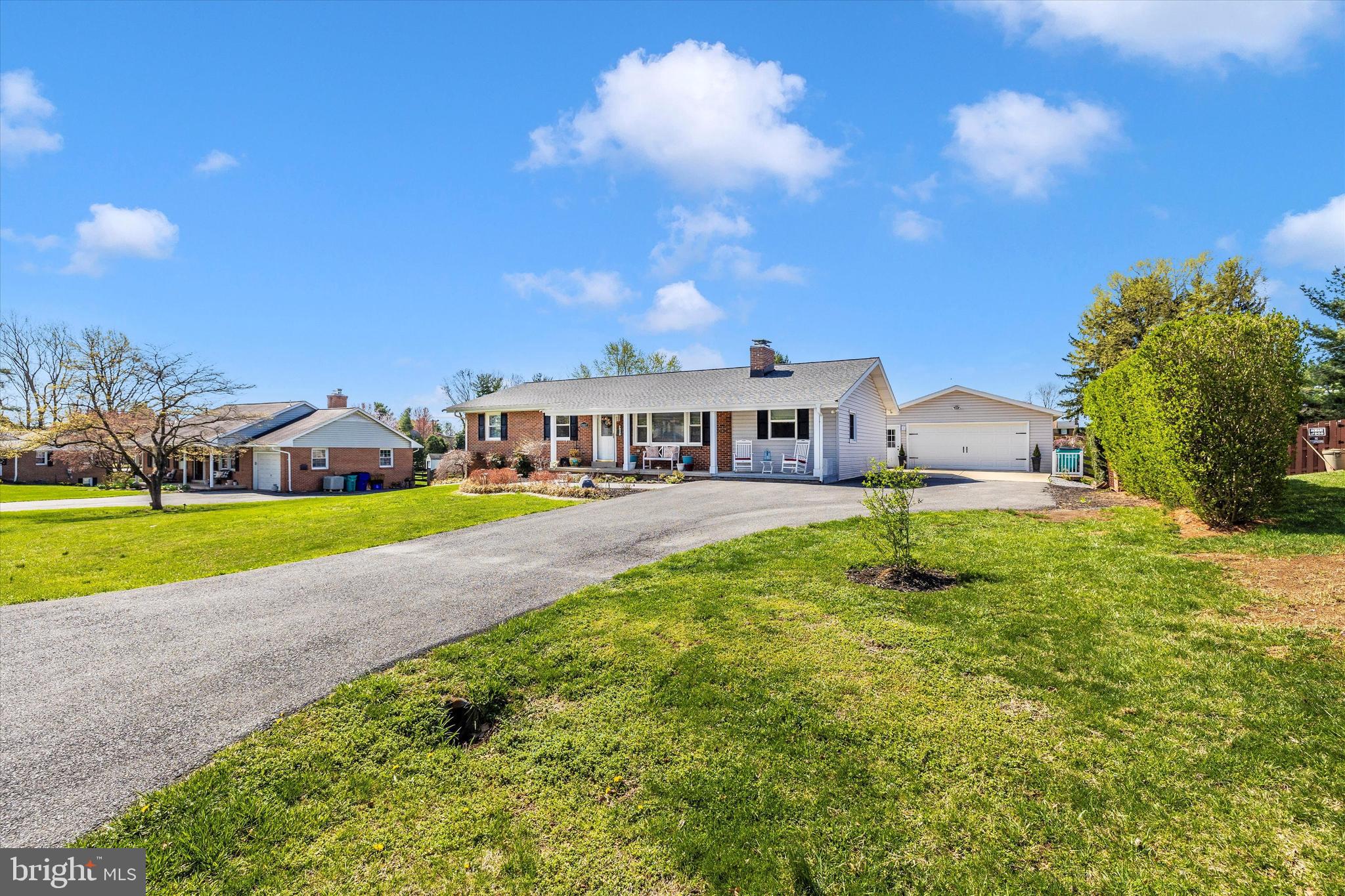 8107 Broadview Drive Frederick, MD 21701 - Photo 49 of 54 a view of house with garden and tall trees