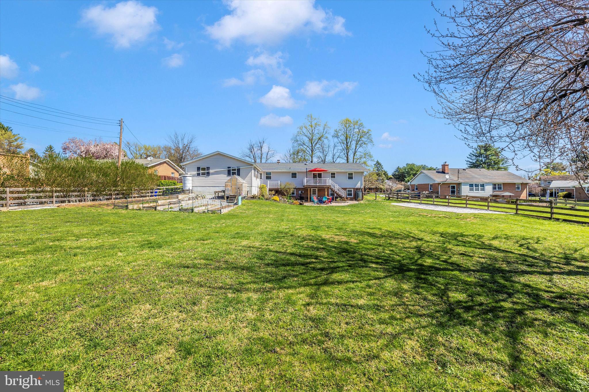 8107 Broadview Drive Frederick, MD 21701 - Photo 50 of 54 a view of a house with a big yard and large trees