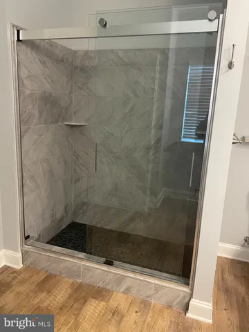 a view of a room that has a window in it