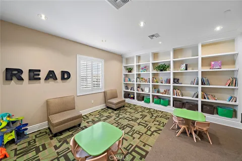 a sign broad in front of the red brick house