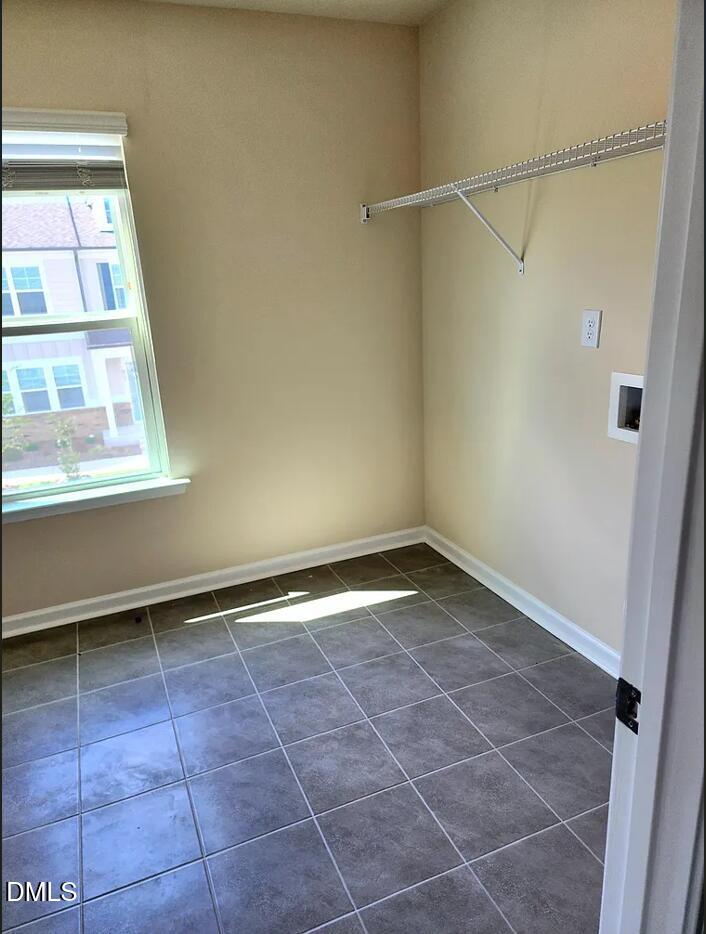 237 Truss Bridge Street Fuquay-Varina, NC 27526 - Photo 14 of 20 a view of an empty room with a window