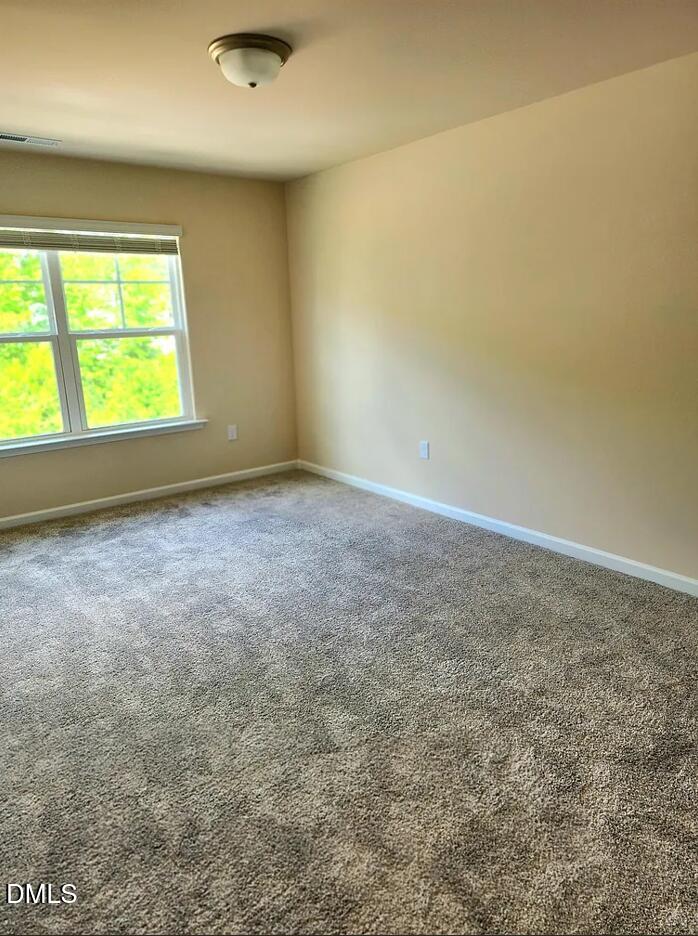 237 Truss Bridge Street Fuquay-Varina, NC 27526 - Photo 18 of 20 an empty room with a window